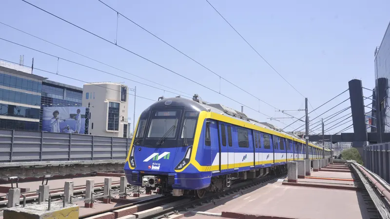 A Mumbai Metro Yellow Line train on an elevated track